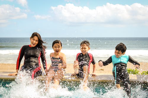 family travel beach surfing international